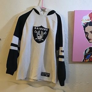 Raiders sweater originally over $150.00 has stain